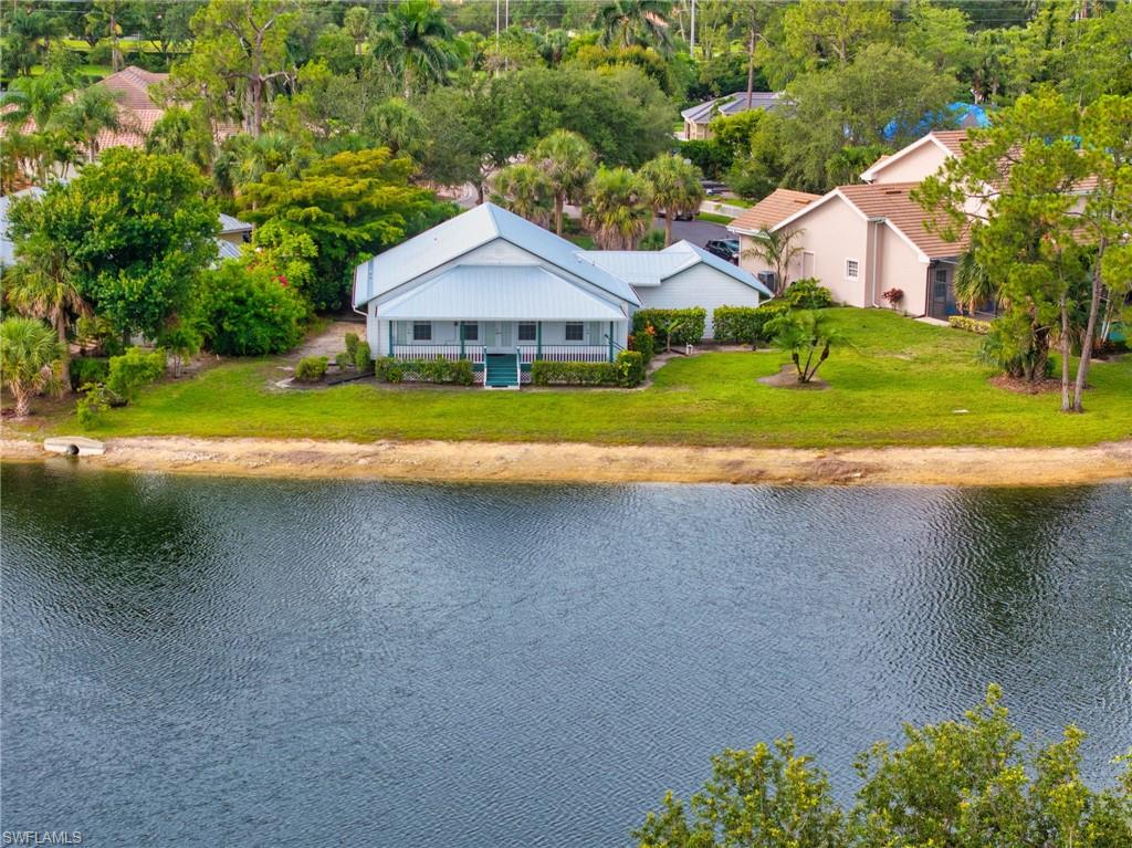 3988 Reflection Court Naples, FL 34109 - Photo 5 of 50 View from above of property featuring a large body of water