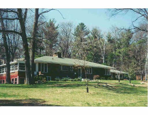 121 Slough Road Harvard, MA 01451 - Photo 1 of 1 a front view of a house with a garden