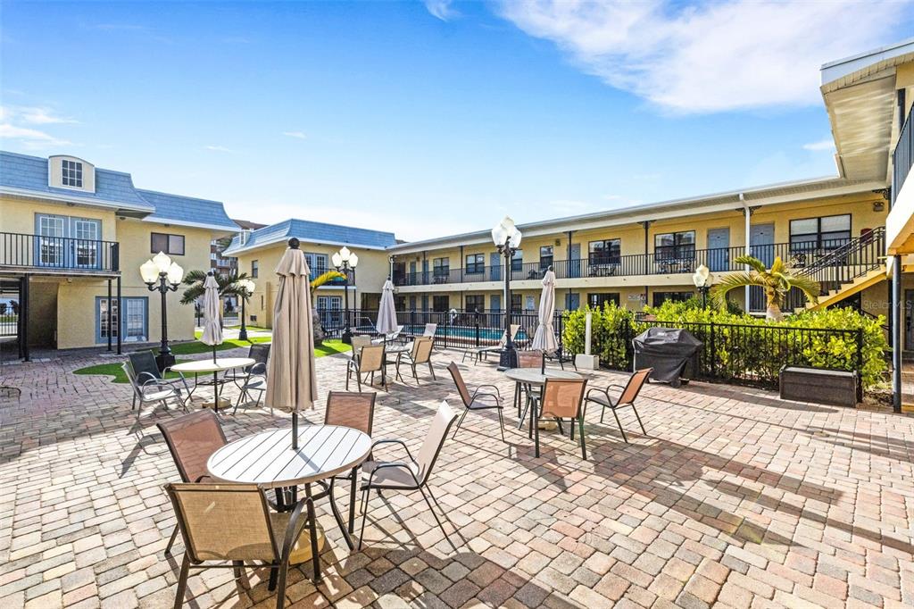 16333 Gulf Boulevard, Unit 215 Redington Beach, FL 33708 - Photo 32 of 38 a view of a house with backyard porch and patio