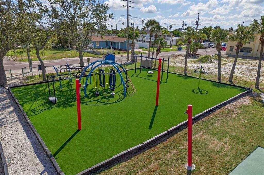 16333 Gulf Boulevard, Unit 215 Redington Beach, FL 33708 - Photo 35 of 38 a view of a park with benches