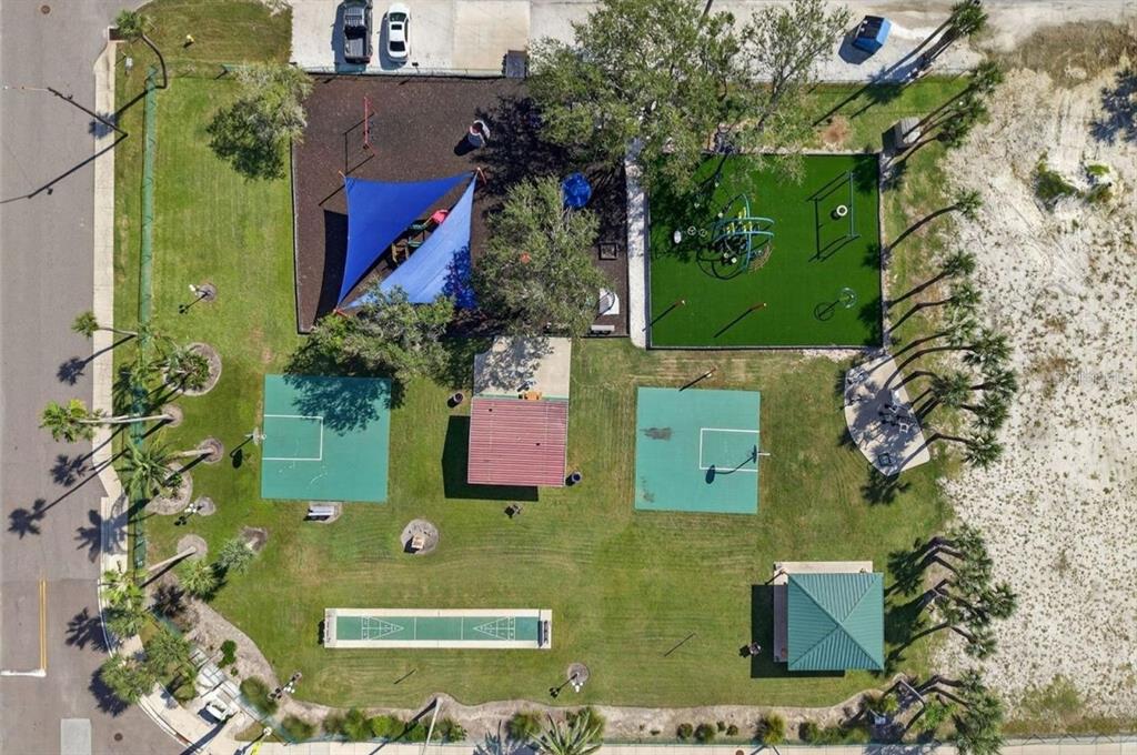 16333 Gulf Boulevard, Unit 215 Redington Beach, FL 33708 - Photo 38 of 38 an aerial view of a house with a yard