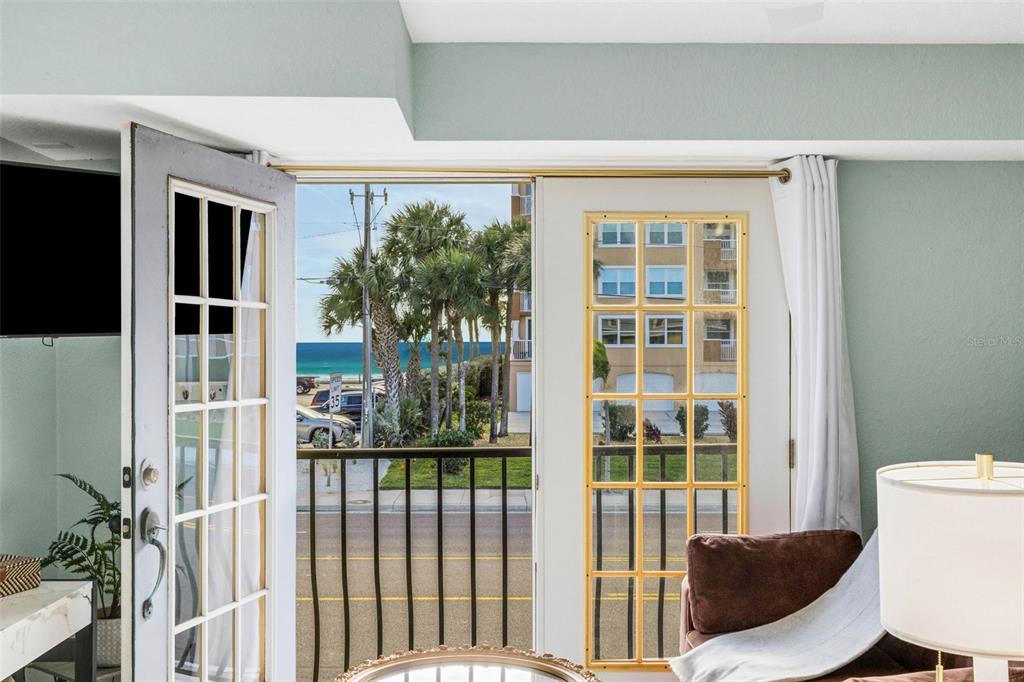 16333 Gulf Boulevard, Unit 215 Redington Beach, FL 33708 - Photo 8 of 38 a view of a house with a porch