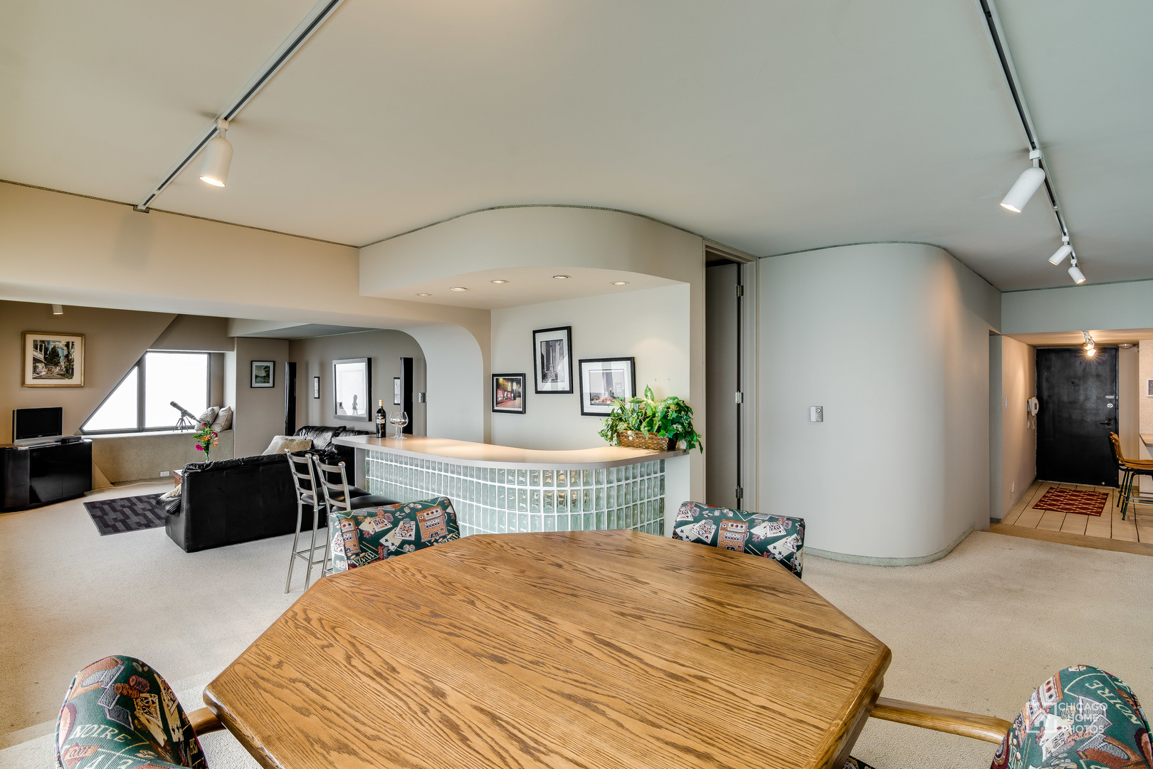 175 East Delaware Place, Unit 5609 Chicago, IL 60611 - Photo 11 of 28 a bed room with a bed and a television