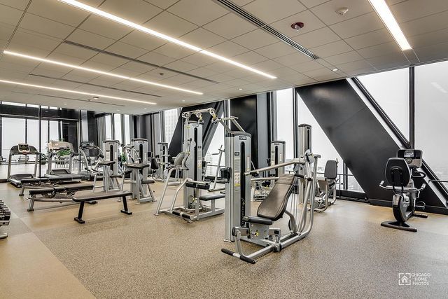 175 East Delaware Place, Unit 5609 Chicago, IL 60611 - Photo 23 of 28 a view of a room with gym equipment