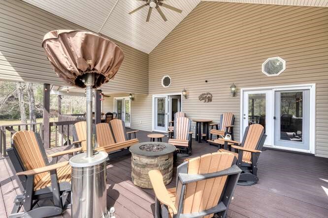 2121 Die Bend Road Murphy, NC 28906 - Photo 16 of 47 a view of a patio with couches table and chairs and potted plants