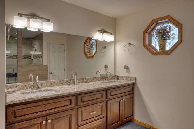 2121 Die Bend Road Murphy, NC 28906 - Photo 34 of 47 a bathroom with a granite countertop sink and a mirror