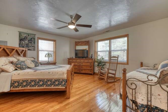 2121 Die Bend Road Murphy, NC 28906 - Photo 36 of 47 a bedroom with furniture and a wooden floor