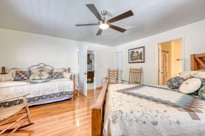2121 Die Bend Road Murphy, NC 28906 - Photo 37 of 47 a bedroom with a bed and wooden floor