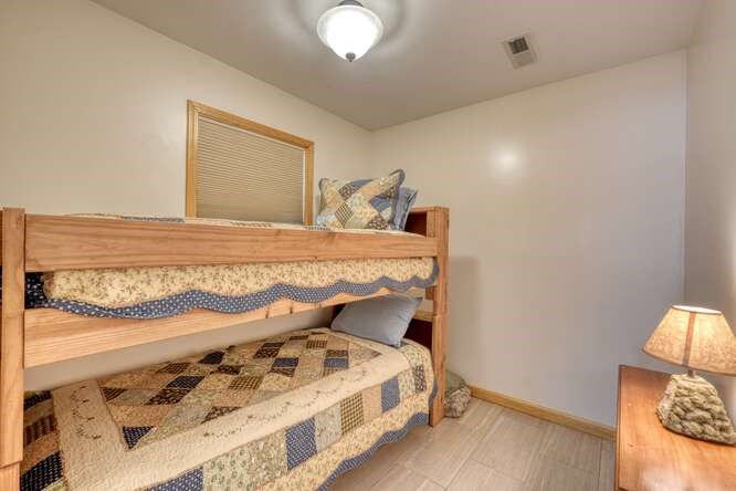 2121 Die Bend Road Murphy, NC 28906 - Photo 42 of 47 a bedroom with a bed and wooden floor