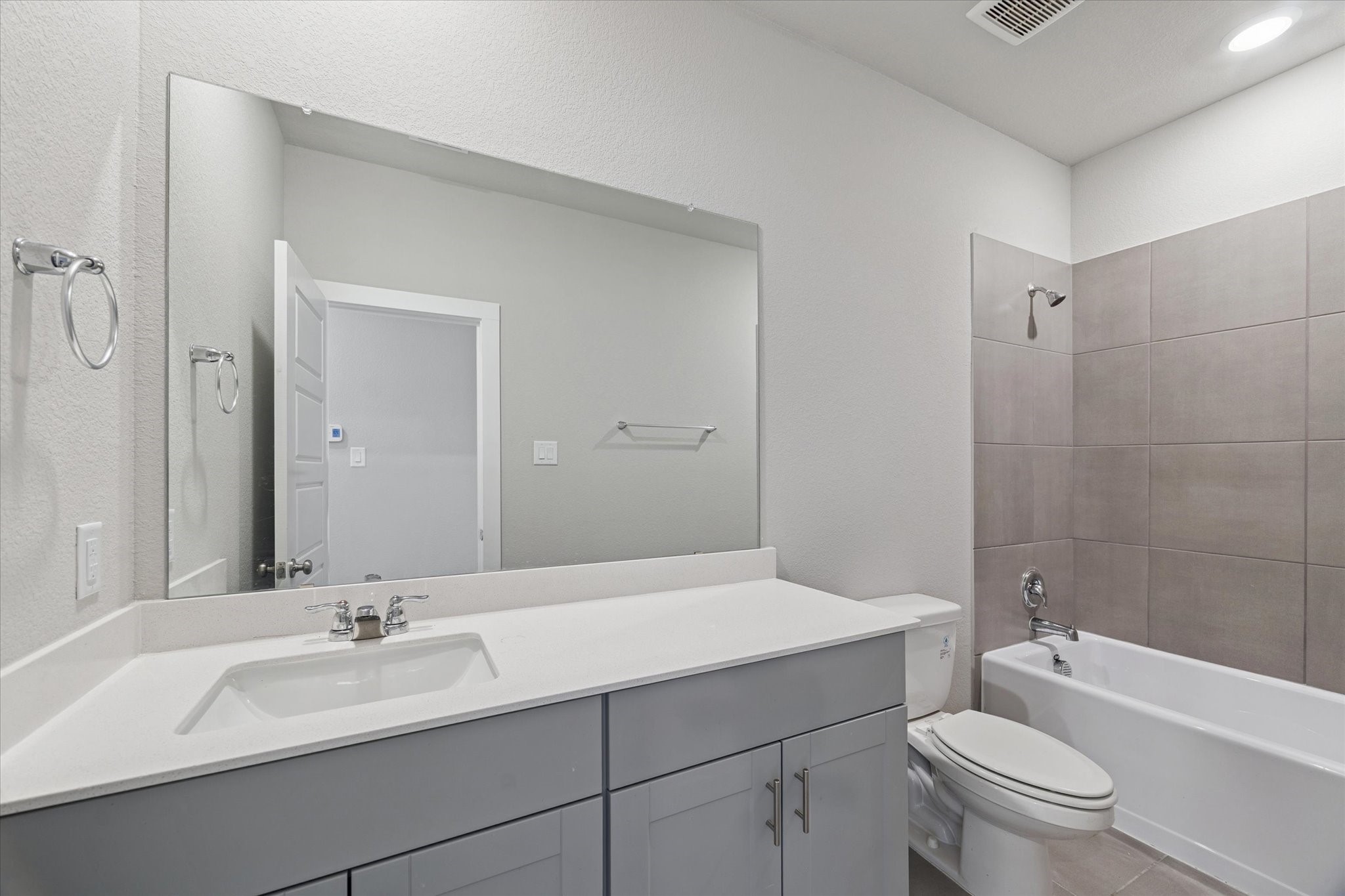 1510 King Rnch Road Conroe, TX 77301 - Photo 15 of 18 a bathroom with a sink a toilet and shower