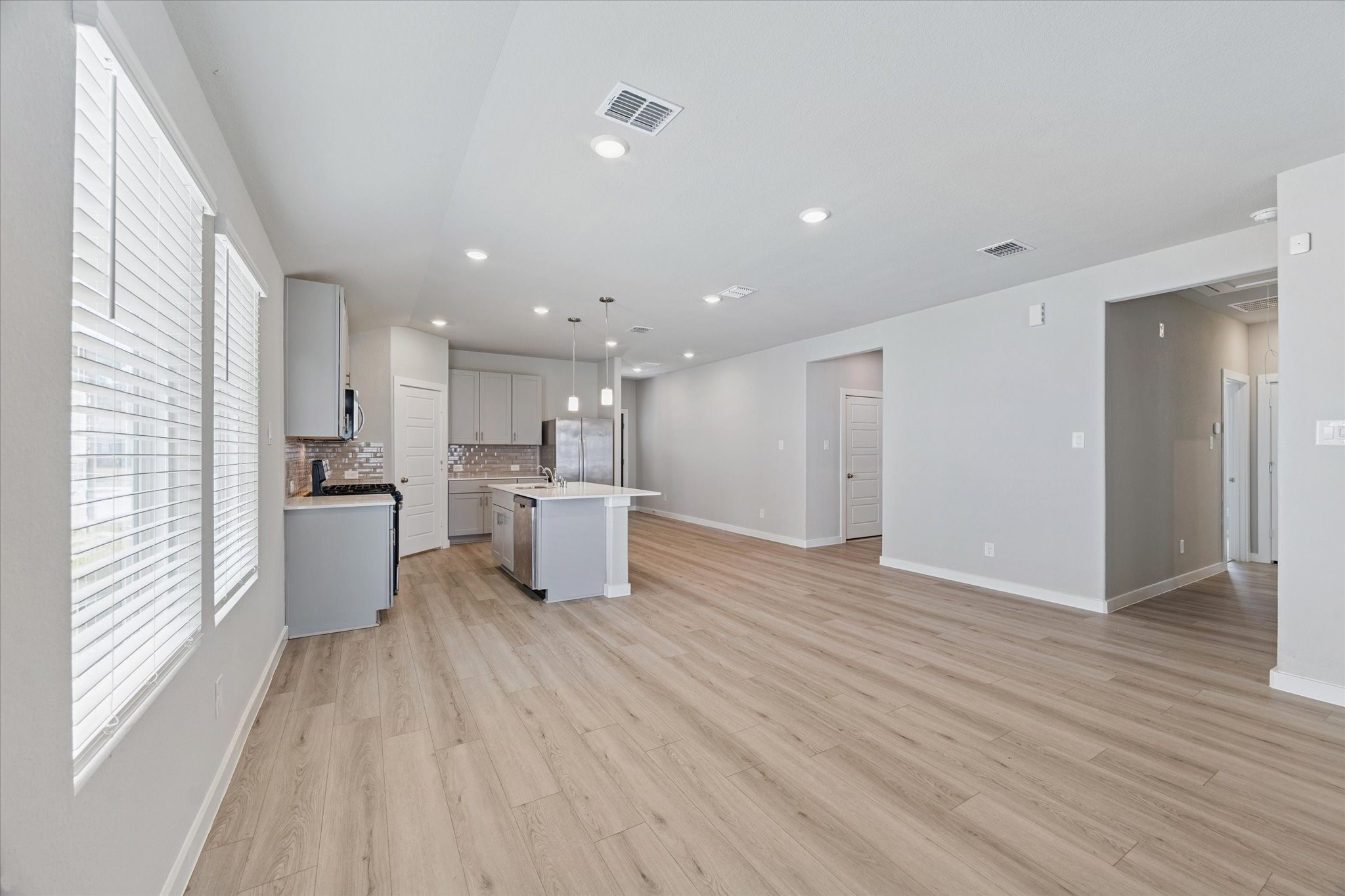 1510 King Rnch Road Conroe, TX 77301 - Photo 8 of 18 a view of kitchen with wooden floor