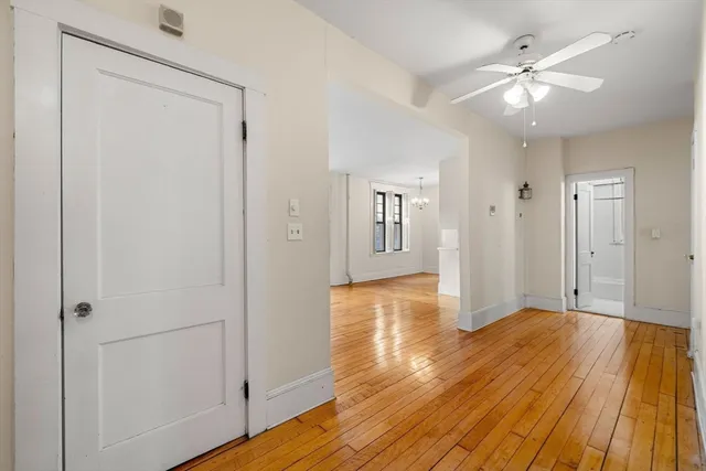 a view of a livingroom with wooden floor