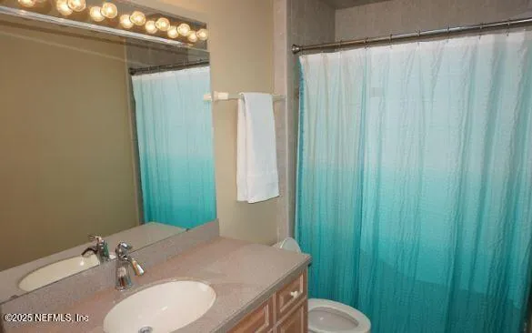 a view of a two chair in the balcony