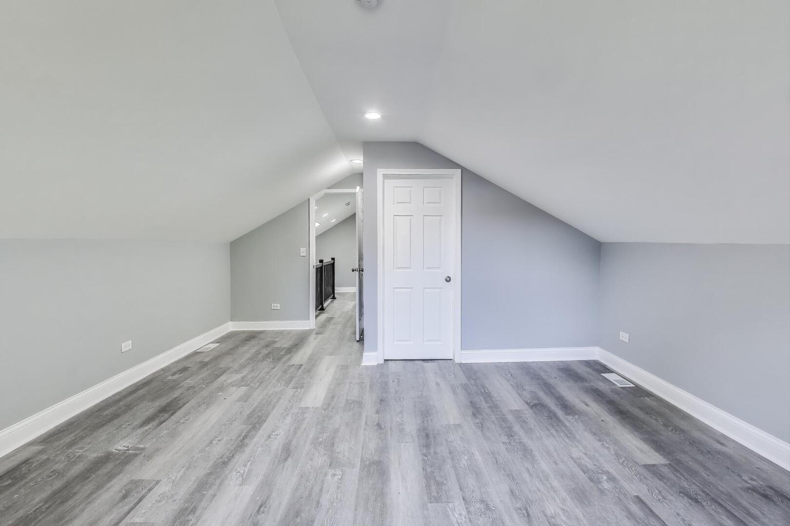 Undisclosed Address Chicago, IL 60622 - Photo 22 of 33 a view of an empty room with wooden floor