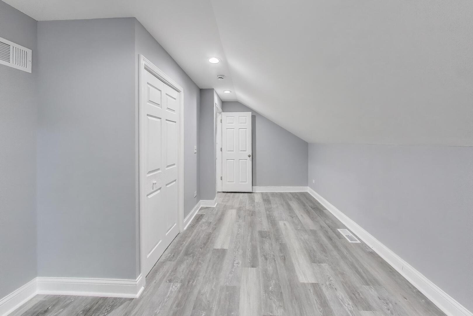 Undisclosed Address Chicago, IL 60622 - Photo 25 of 33 a view of empty room with wooden floor