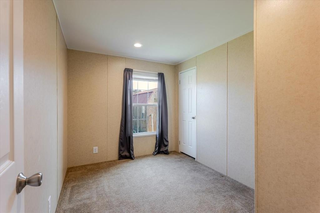126 Starry Sky Court Springtown, TX 76082 - Photo 12 of 34 Bedroom with carpet floors
