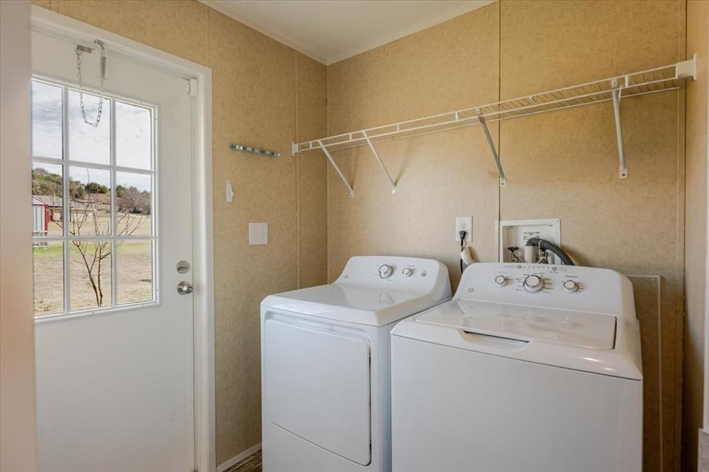 126 Starry Sky Court Springtown, TX 76082 - Photo 18 of 34 Washer and Dryer convey with the house.