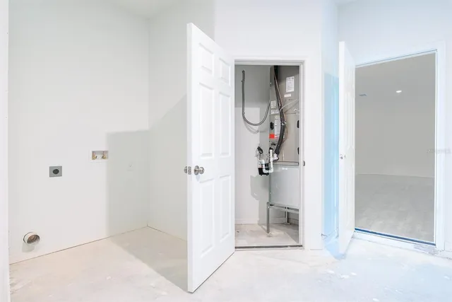 a view of an empty room with a empty shelves