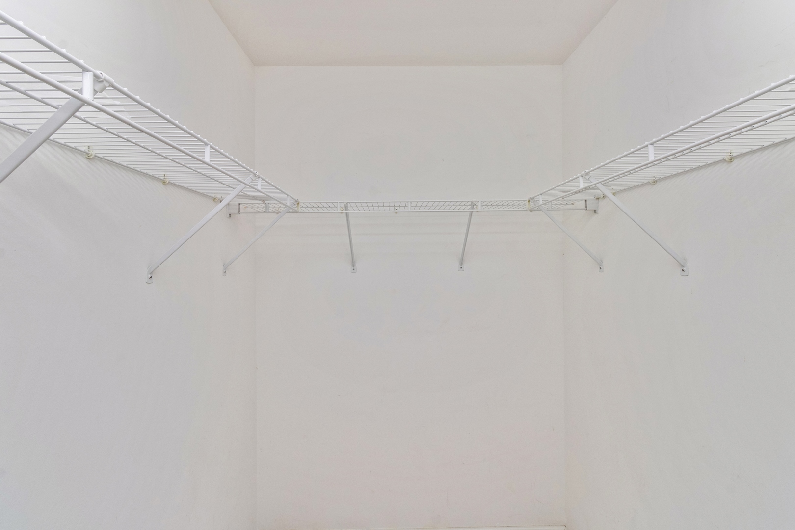 5471 McDonough Road Hoffman Estates, IL 60192 - Photo 18 of 32 a view of a room with racks on the wall