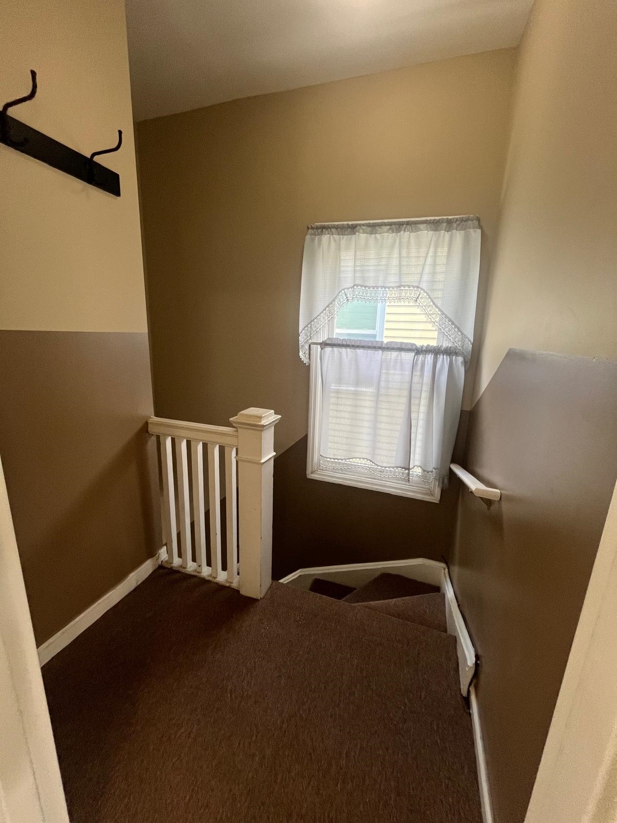 88 Devon Terrace, Unit 2 Kearny, NJ 07032 - Photo 12 of 13 a view of entryway and hall with wooden floor