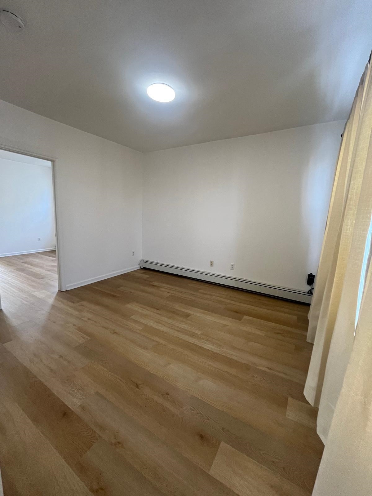 88 Devon Terrace, Unit 2 Kearny, NJ 07032 - Photo 4 of 13 a view of an empty room