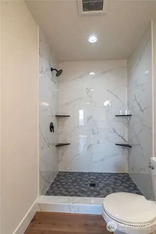 a bathroom with a sink and a toilet