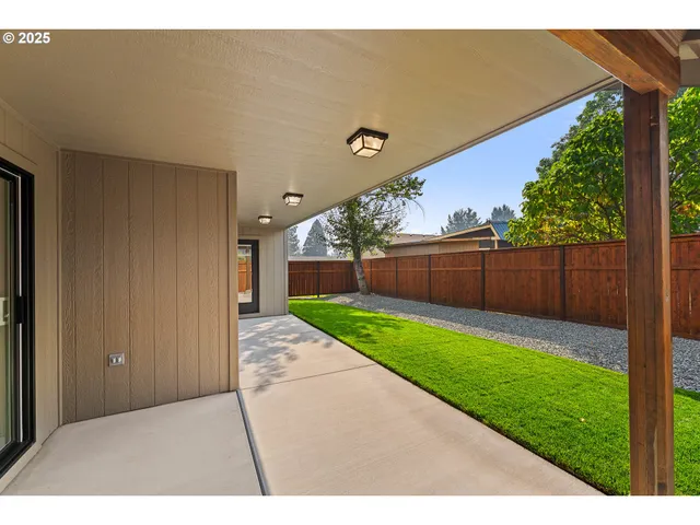 a view of backyard with green space