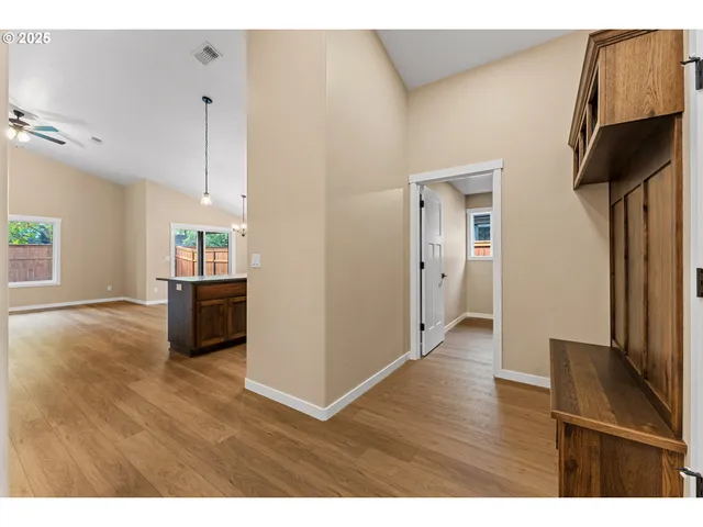 a open kitchen with refrigerator and a dishwasher