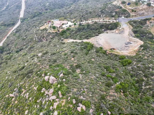 a view of a city with mountain