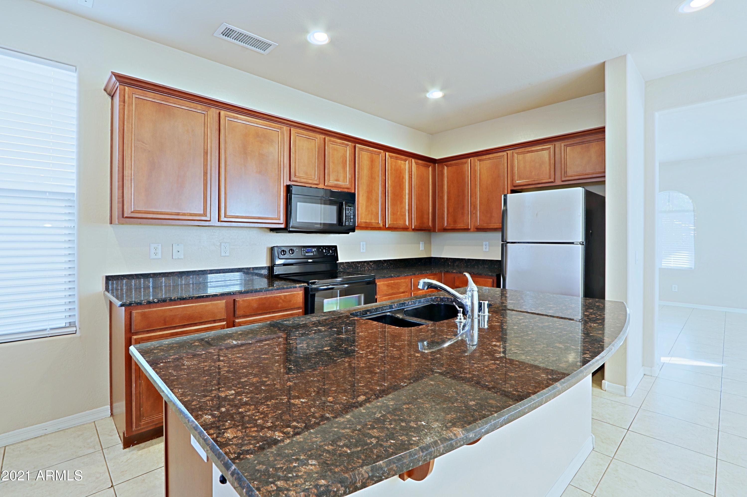 3416 West Florimond Road Phoenix, AZ 85086 - Photo 4 of 41 Kitchen 1