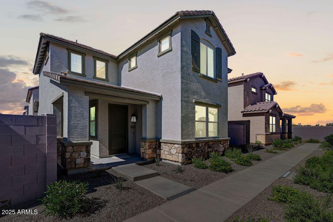 9964 West Piccadilly Road Avondale, AZ 85392 - Photo 1 of 52 a front view of a house