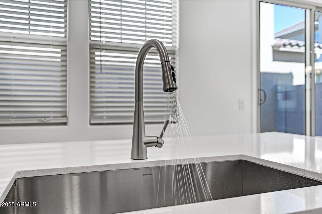 9964 West Piccadilly Road Avondale, AZ 85392 - Photo 20 of 52 a view of a bathroom with a bathtub