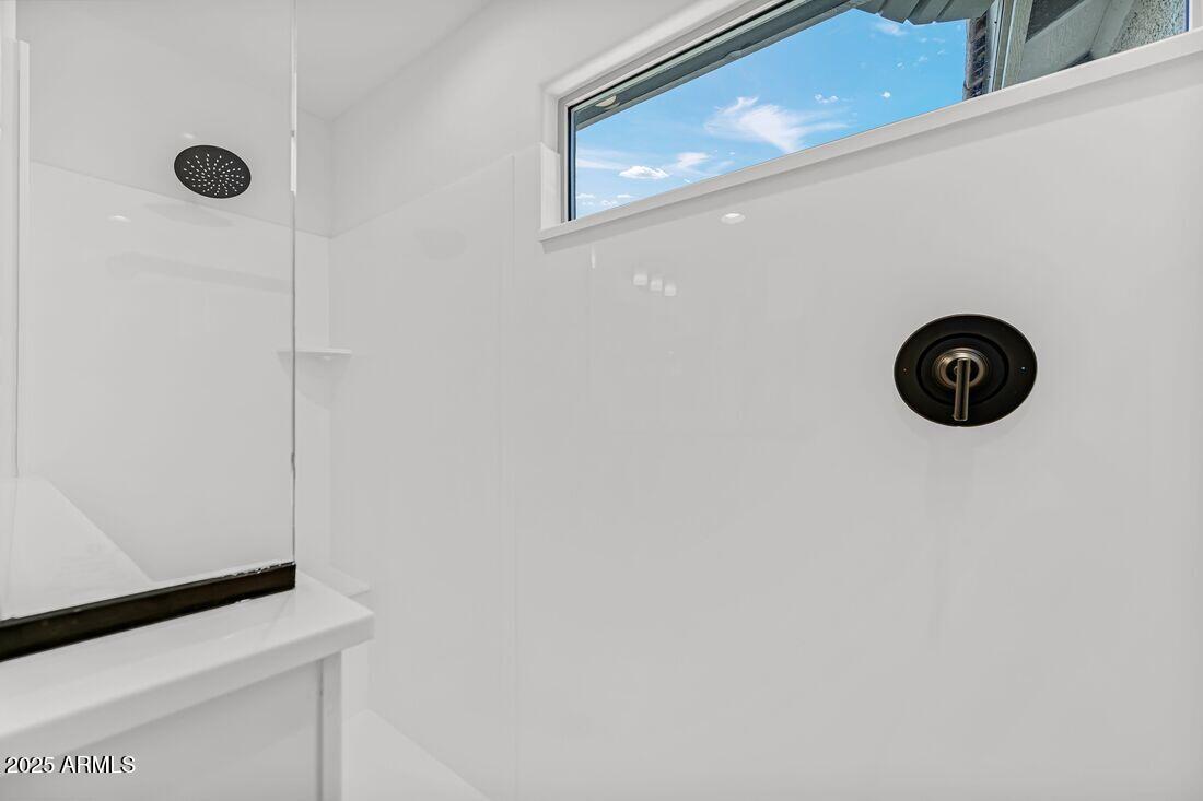 9964 West Piccadilly Road Avondale, AZ 85392 - Photo 27 of 52 a view of a refrigerator and a stove