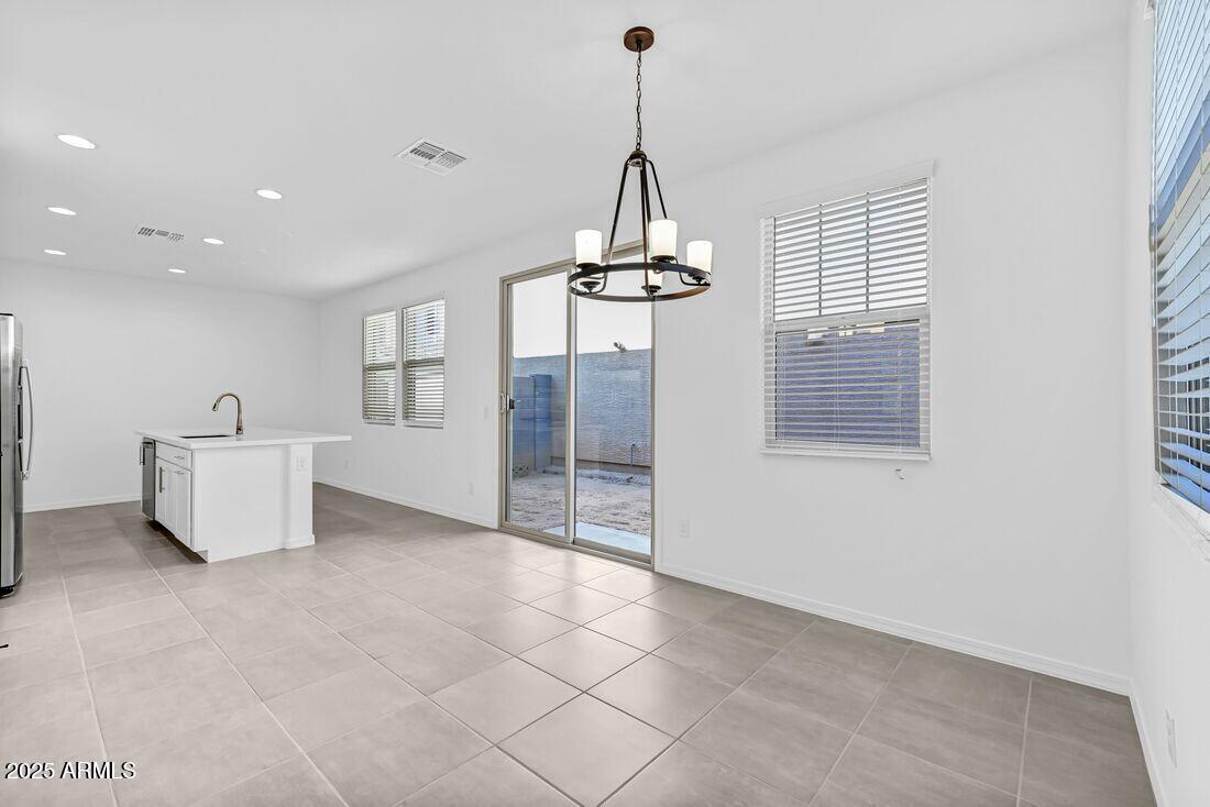 9964 West Piccadilly Road Avondale, AZ 85392 - Photo 34 of 52 a view of a room with windows