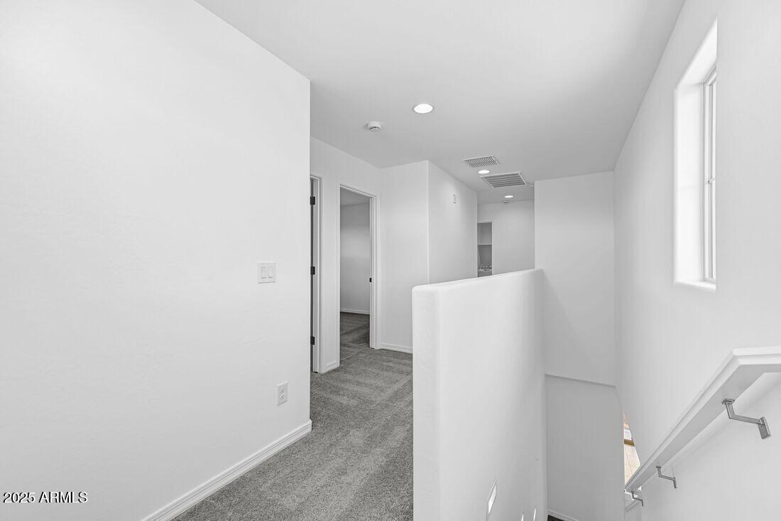 9964 West Piccadilly Road Avondale, AZ 85392 - Photo 38 of 52 a view of a refrigerator in kitchen and an entryway