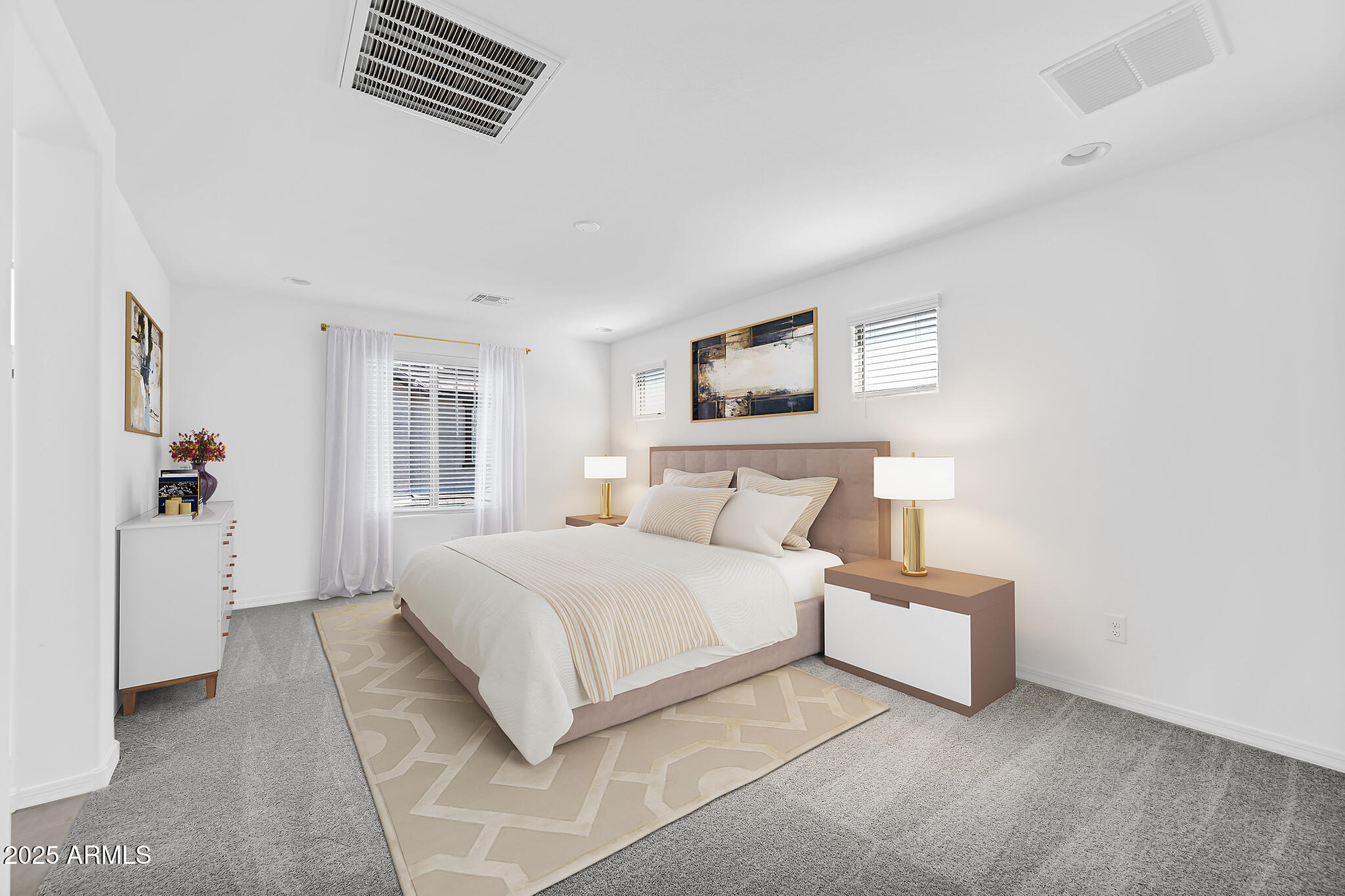 9964 West Piccadilly Road Avondale, AZ 85392 - Photo 4 of 52 a bedroom with a bed and a couch