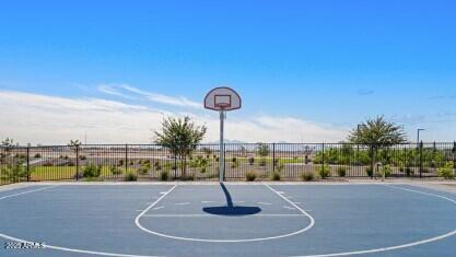 9964 West Piccadilly Road Avondale, AZ 85392 - Photo 51 of 52 a swimming pool with outdoor seating and yard