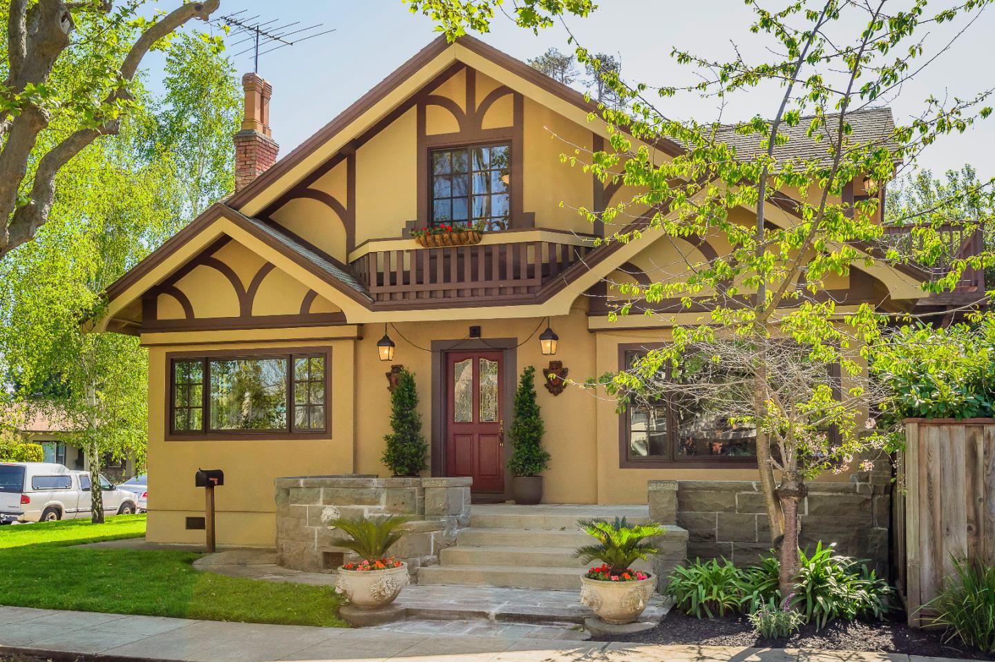a front view of a house with garden