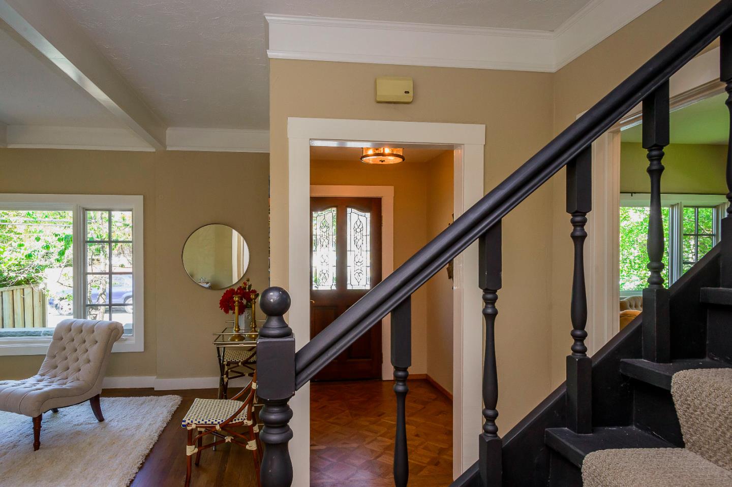 1601 Broadway Burlingame, CA 94010 - Photo 12 of 23 a living room with wooden floor and windows