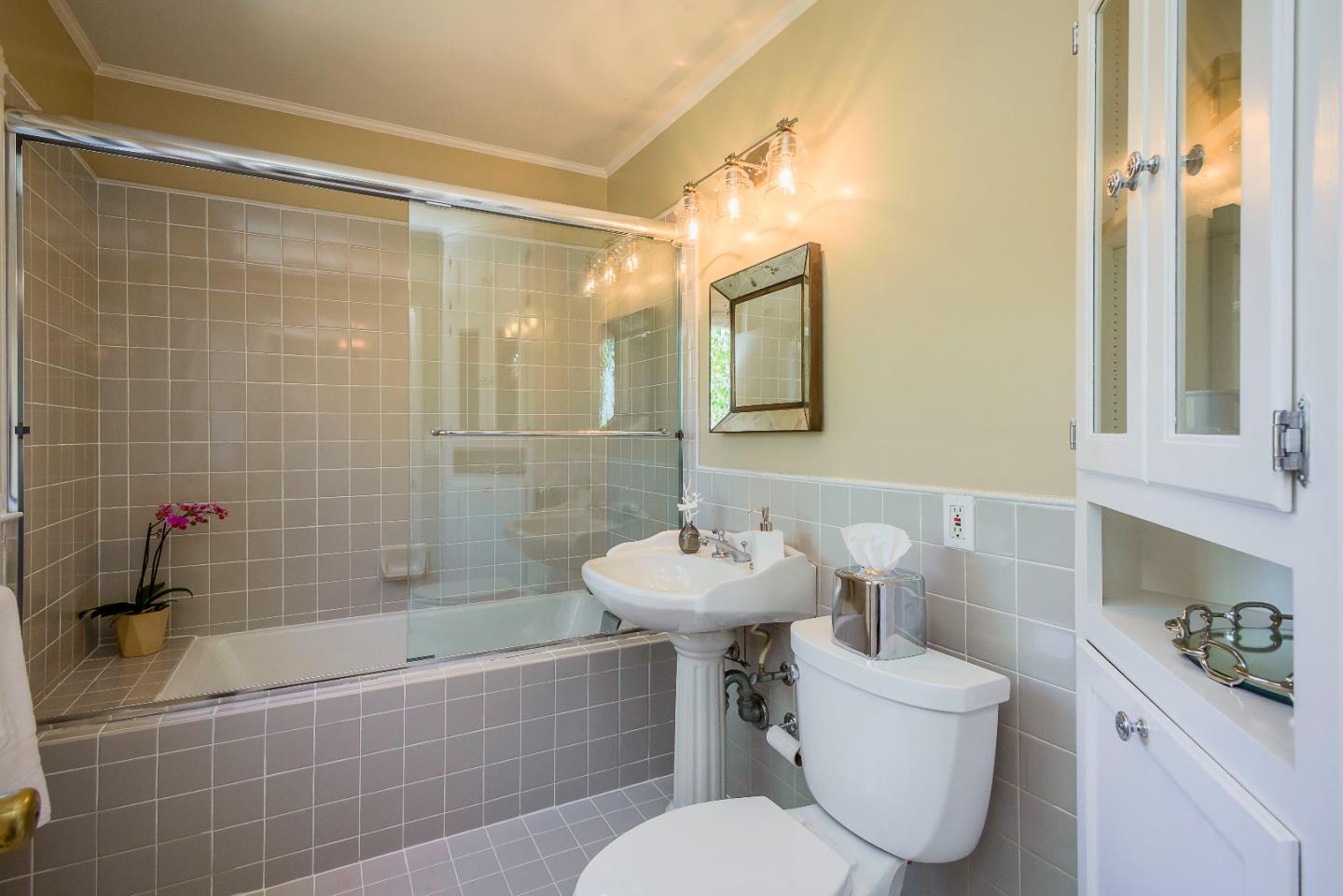 1601 Broadway Burlingame, CA 94010 - Photo 15 of 23 a bathroom with a sink toilet and shower