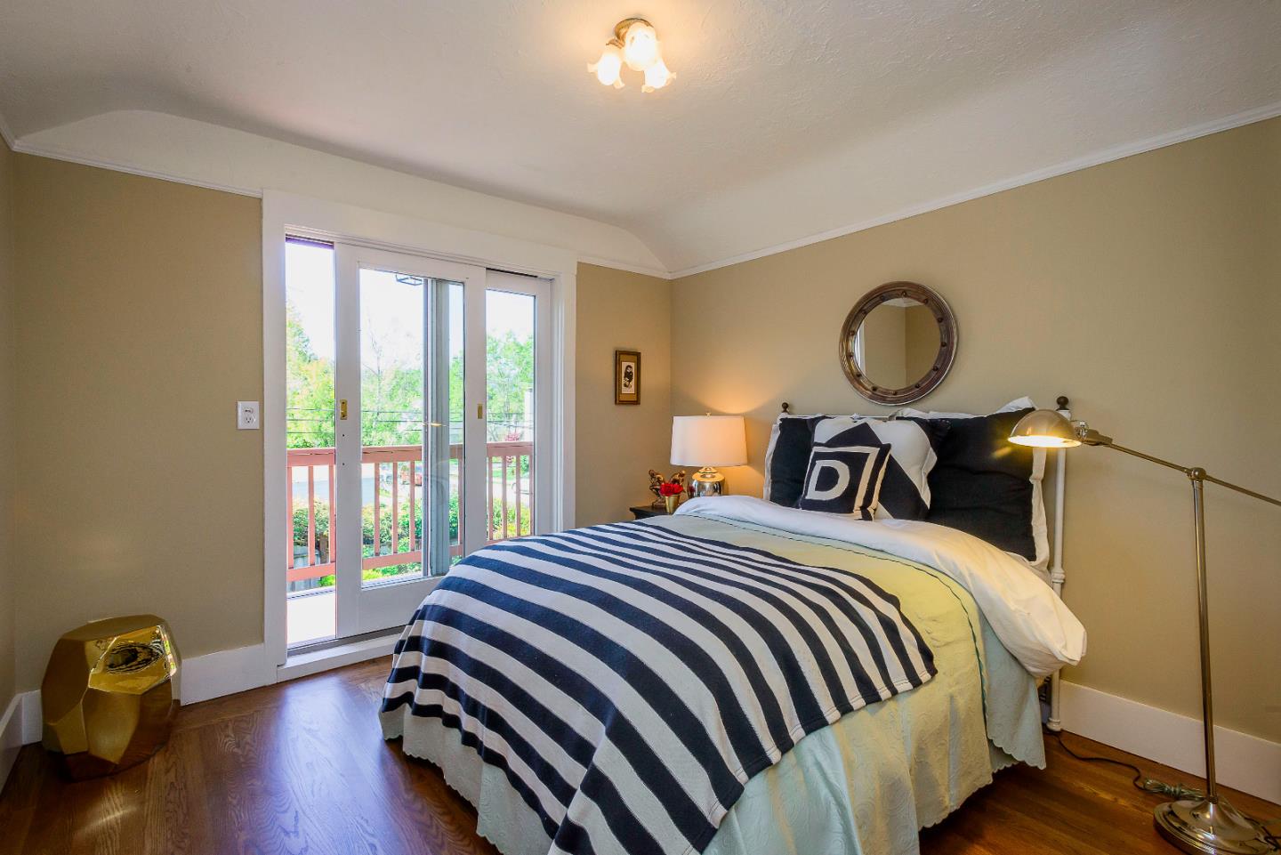 1601 Broadway Burlingame, CA 94010 - Photo 17 of 23 a bed sitting in a bedroom next to a window