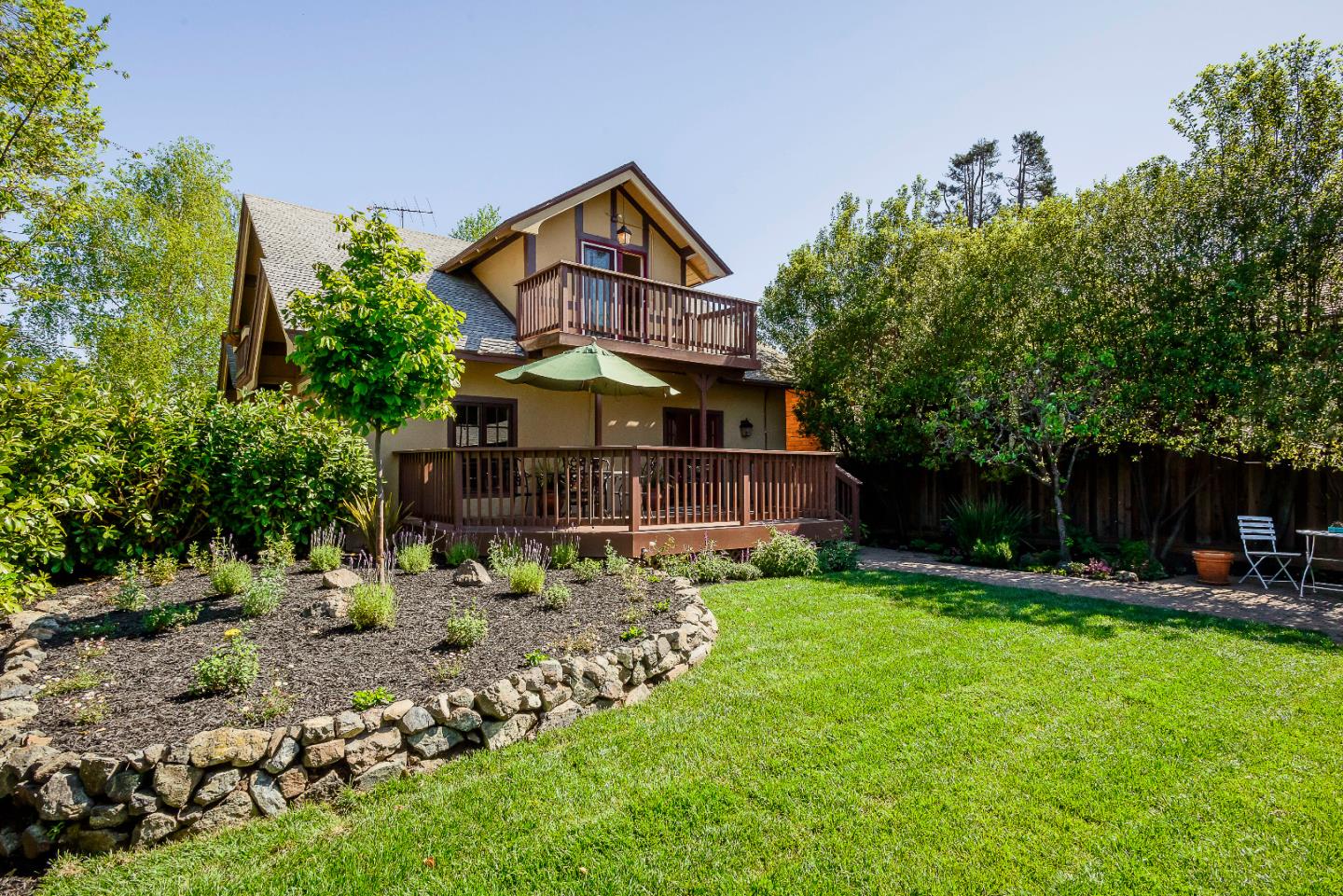 1601 Broadway Burlingame, CA 94010 - Photo 21 of 23 a front view of a house with a yard