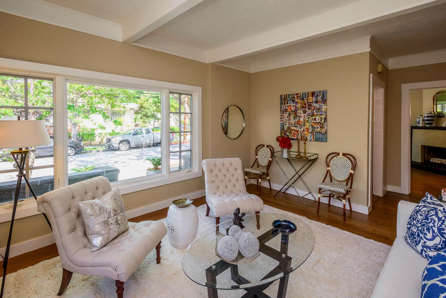 1601 Broadway Burlingame, CA 94010 - Photo 3 of 23 a living room with furniture a rug potted plant and a large window