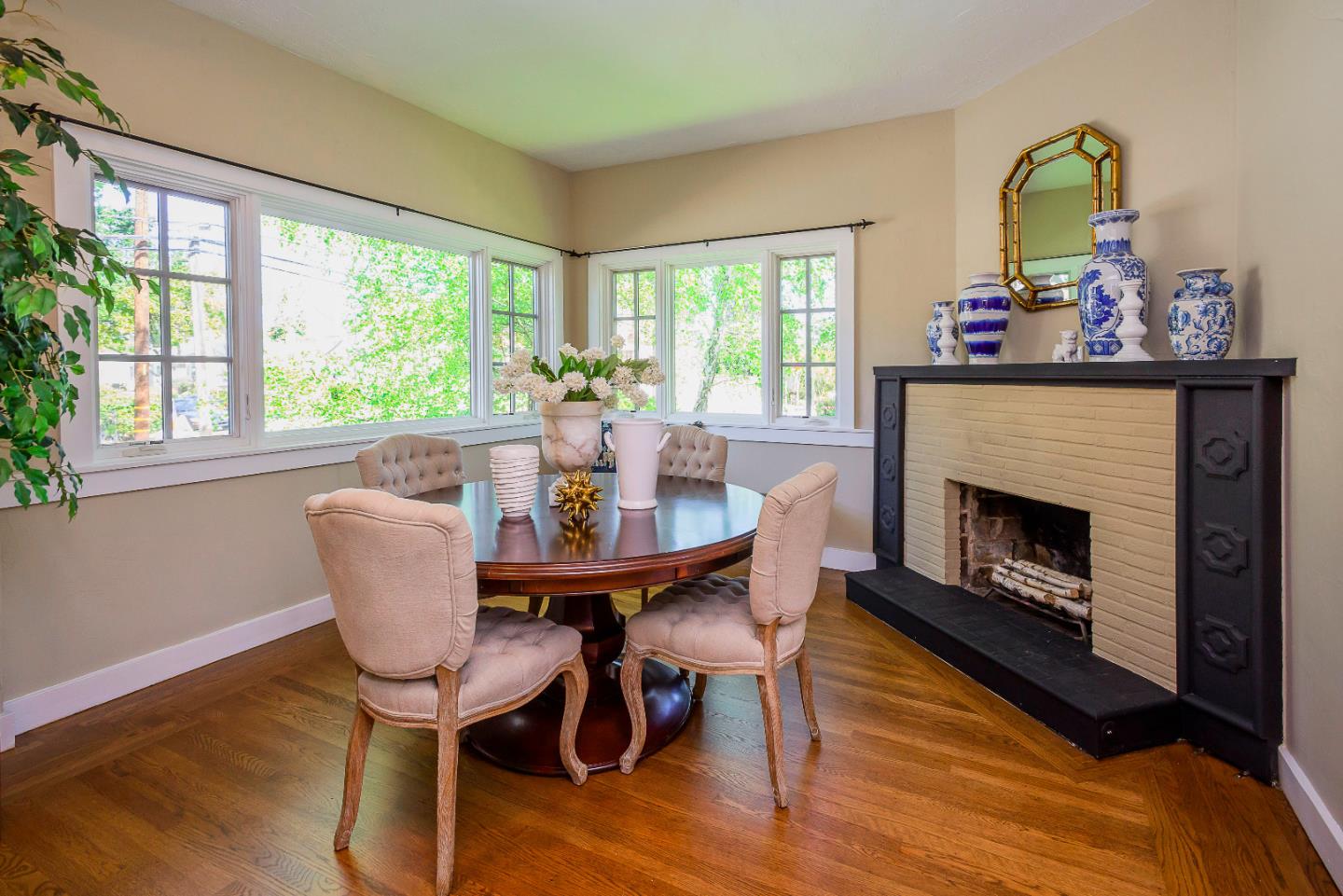 1601 Broadway Burlingame, CA 94010 - Photo 6 of 23 a view of a dining room with furniture window and wooden floor