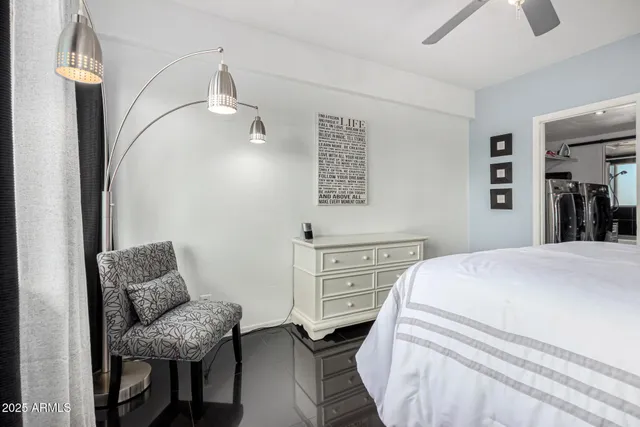 a bedroom with a bed and furniture