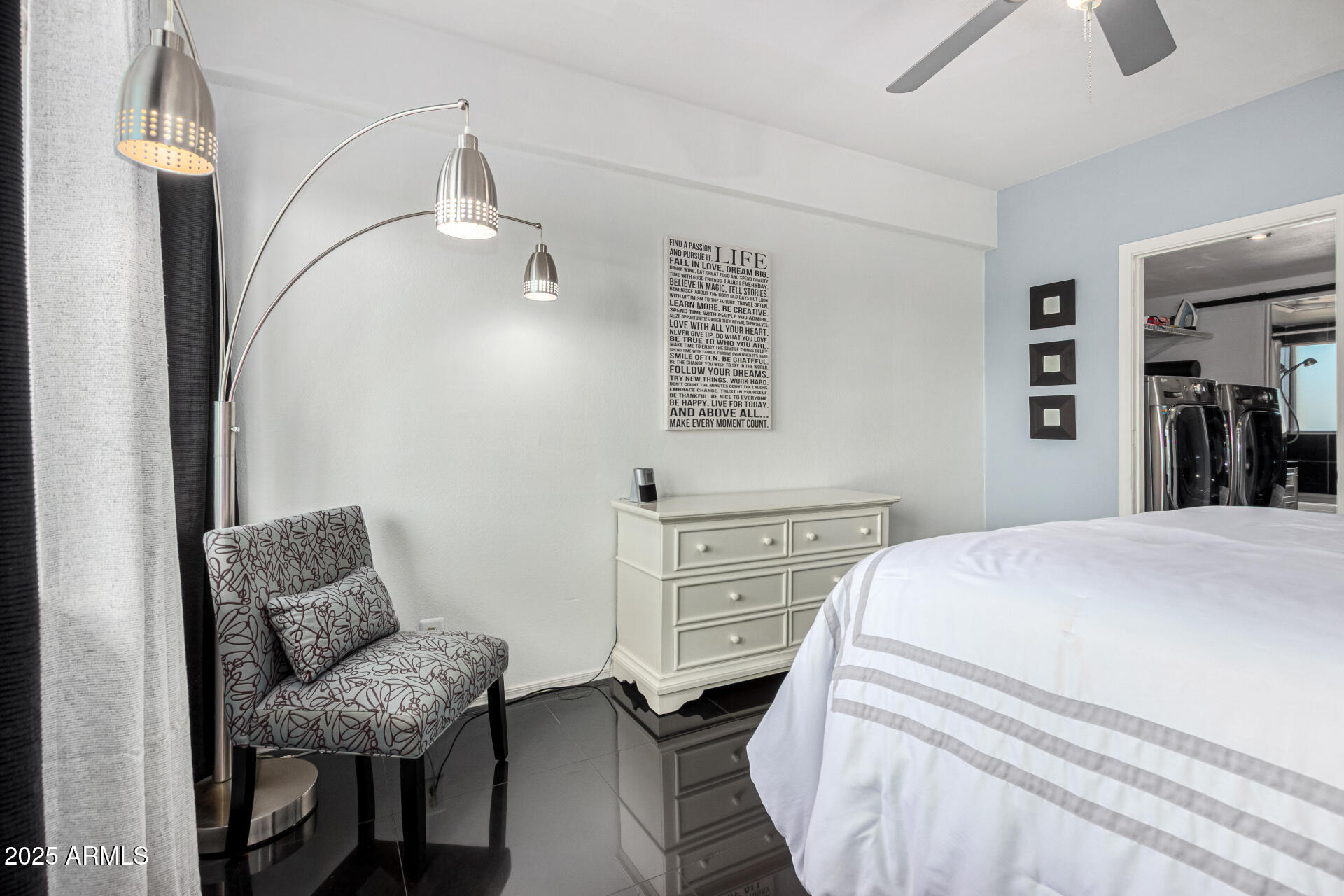 351 East Thomas Road, Unit D505 Phoenix, AZ 85004 - Photo 19 of 28 a bedroom with a bed and furniture