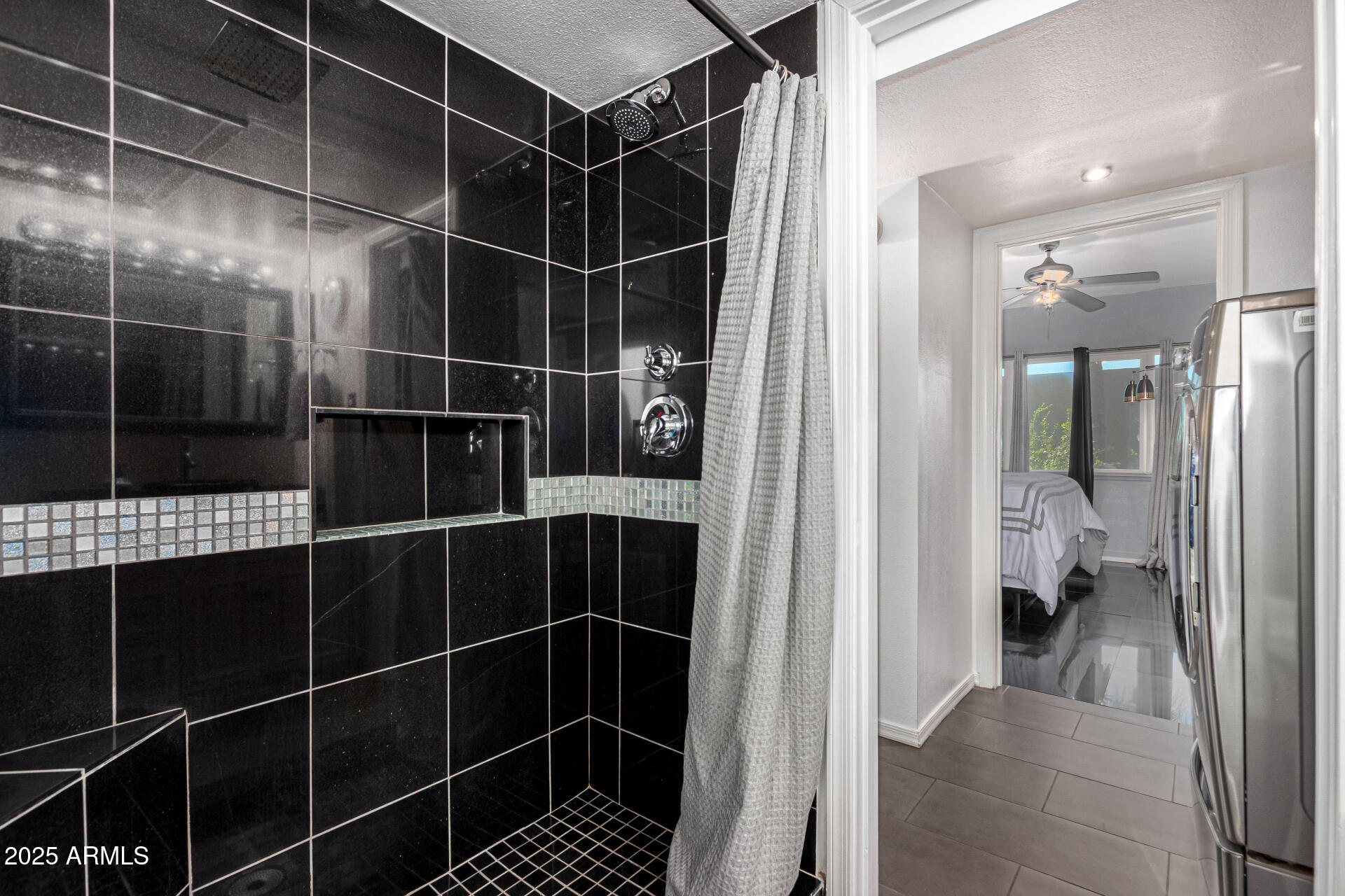 351 East Thomas Road, Unit D505 Phoenix, AZ 85004 - Photo 22 of 28 a bathroom with a glass shower door