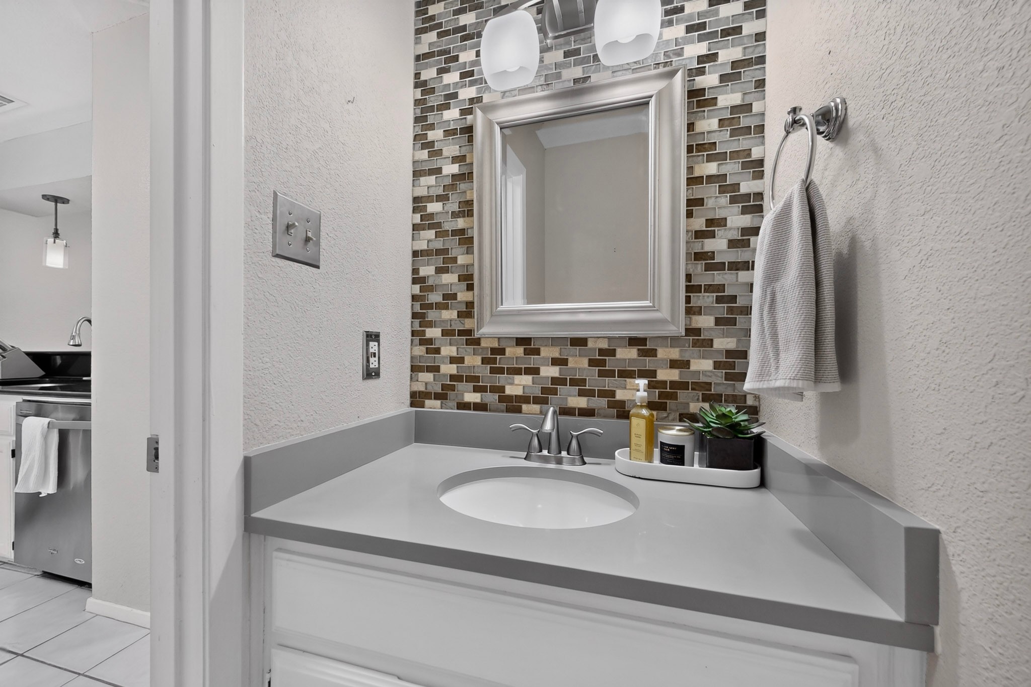 3801 Menchaca Road, Unit 25 Austin, TX 78704 - Photo 11 of 27 Half bath downstairs