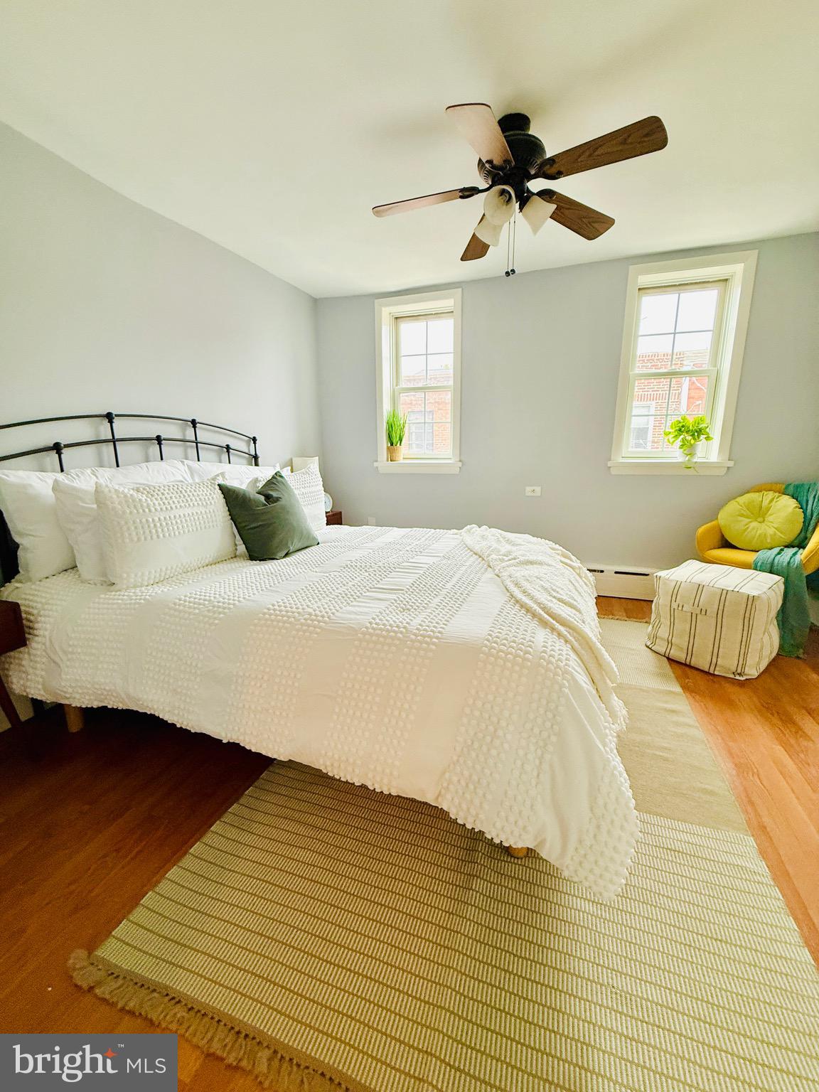 619 Sears Street Philadelphia, PA 19147 - Photo 16 of 23 a bedroom with a bed and a ceiling fan