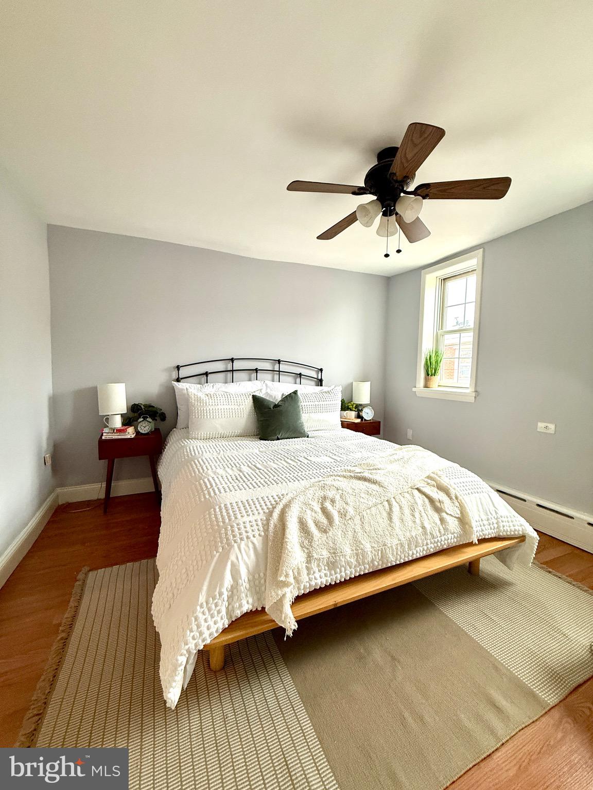 619 Sears Street Philadelphia, PA 19147 - Photo 17 of 23 a bedroom with a bed and window